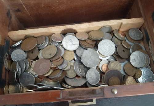 Wooden box with secret compartment filled with a mix or internation coins and costume jewellery